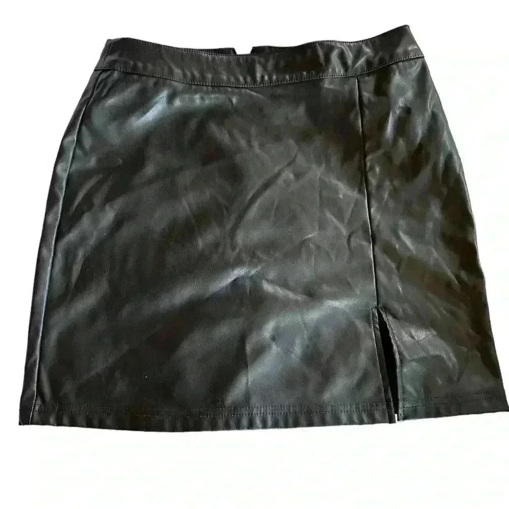 Shein black faux leather mini skirt with from slit and back zip. EUC.